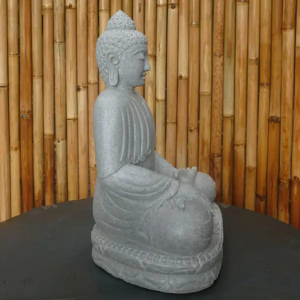 Product image 3 of the product “Seated Buddha made of Riverstone in Bhumisparsha - gesture of touching the earth. 60cm height. ”
